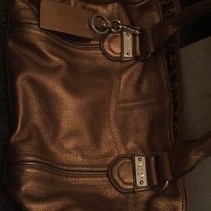 Gently used bronze color purse